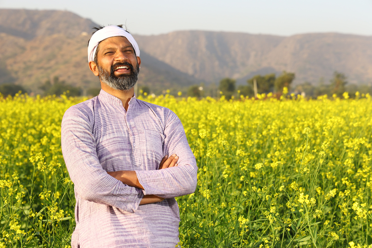 Happy Indian farmer feeling proud.